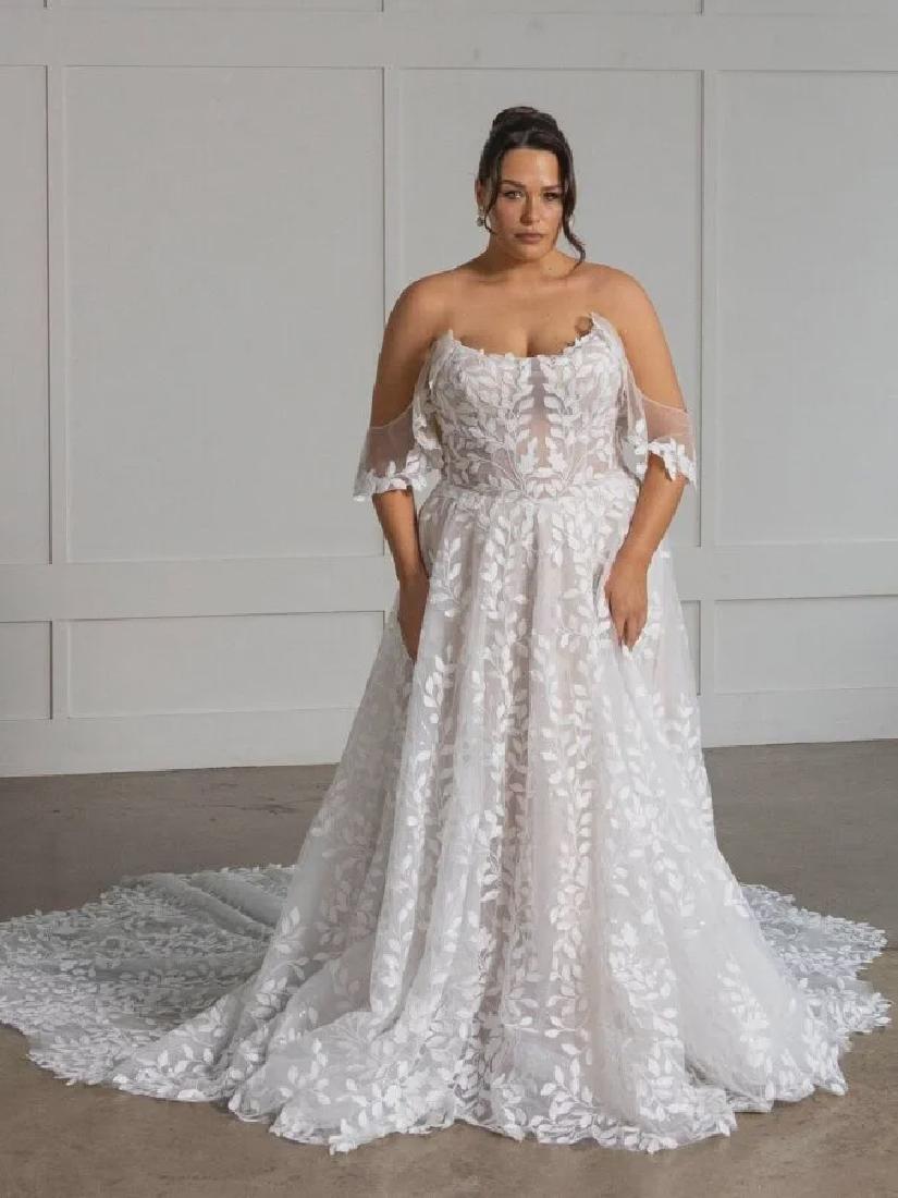 Chris standing up holding his daughter Elva